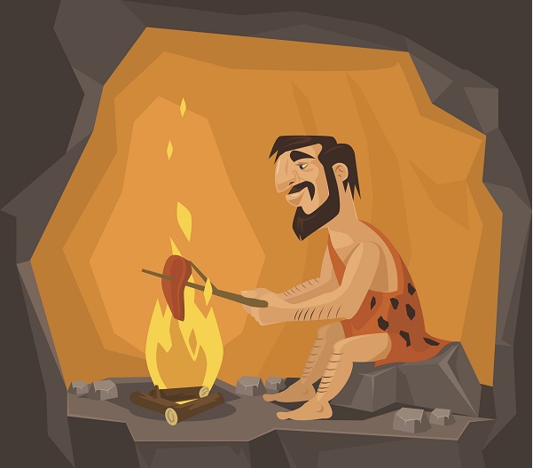 Cartoon illustration of caveman cooking in his cave
