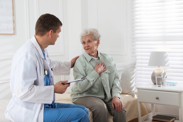 Older adult speaking to doctor during appointment